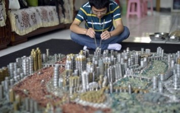 chinese artist builds amazing city model with 50000 coins